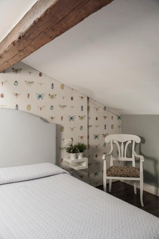 Postel nebo postele na pokoji v ubytování Maxxim Hotel & Loft