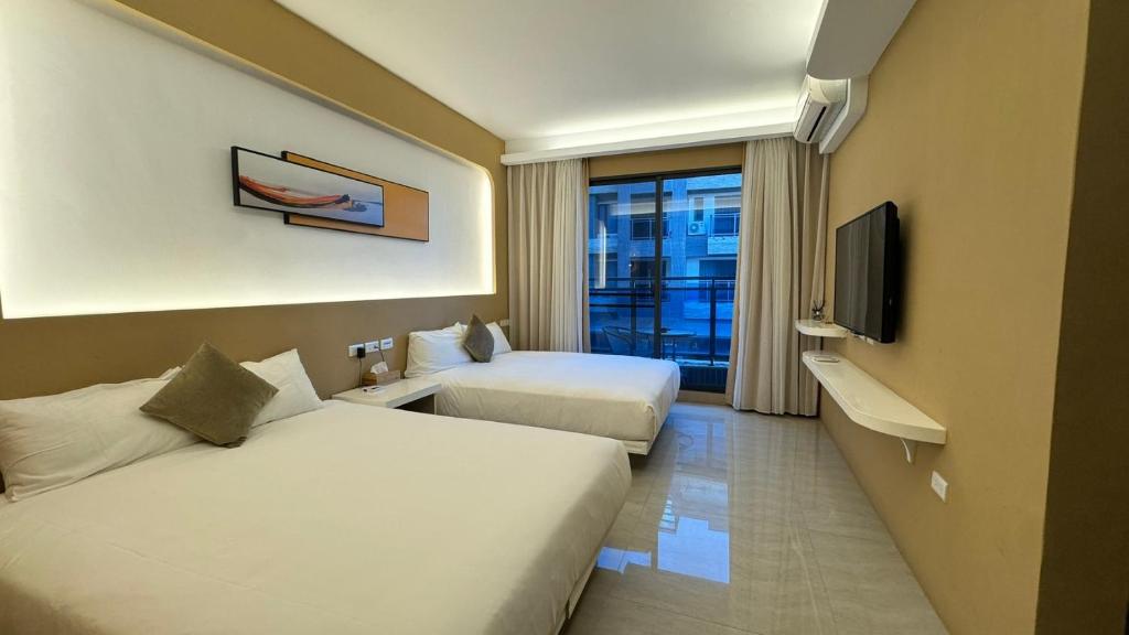 Televisyen dan/atau pusat hiburan di 禾夏民宿Her Shot Inn