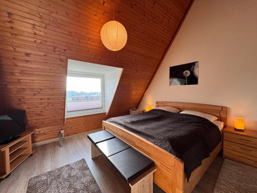 Postel nebo postele na pokoji v ubytování Strandpark