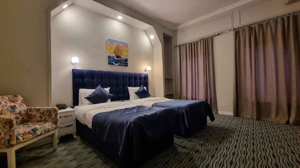 Postel nebo postele na pokoji v ubytování Retro Art Boutique Hotel