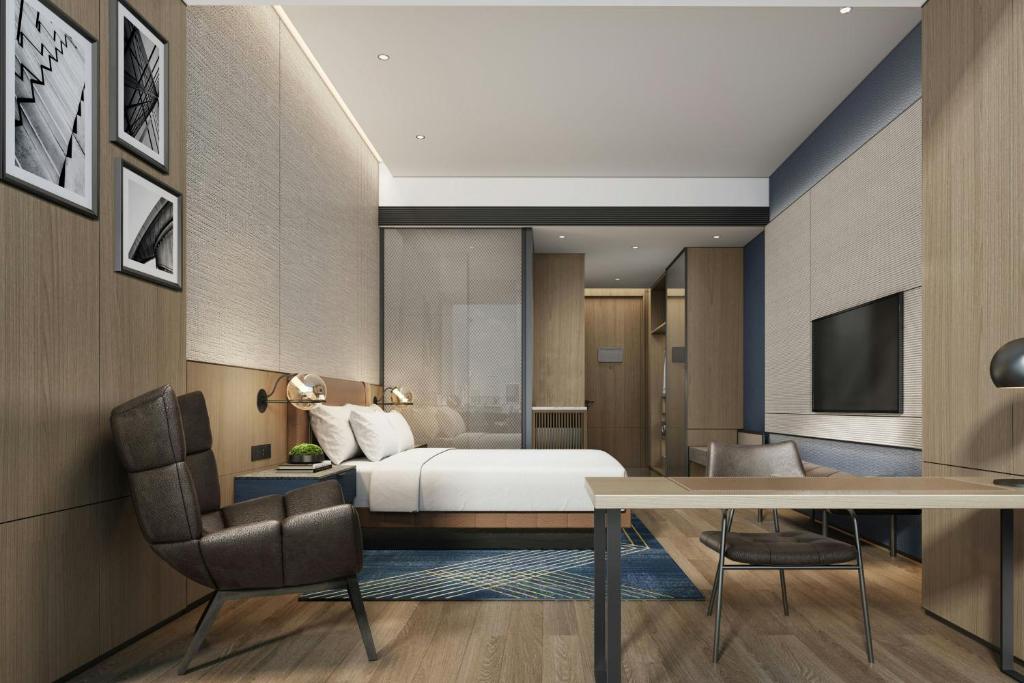 TV a/nebo společenská místnost v ubytování Four Points by Sheraton Hengyang Zhengxiang