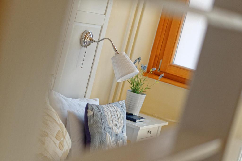 Tündérkert Hotel Noszvajにあるベッド