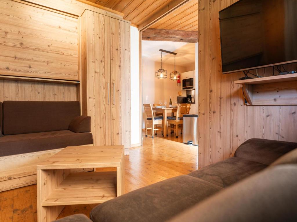 Televízia a/alebo spoločenská miestnosť v ubytovaní Alpensteinbock Saalbach D