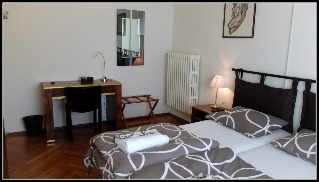 Łóżko lub łóżka w pokoju w obiekcie B&B Piazza Goldoni