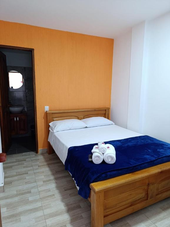 Postel nebo postele na pokoji v ubytování Hotel Macao