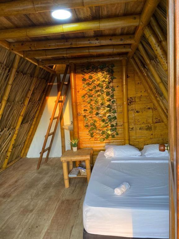 Postel nebo postele na pokoji v ubytování Awala Beach Club