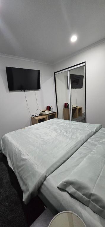 Postel nebo postele na pokoji v ubytování Favona Airport Accomodation