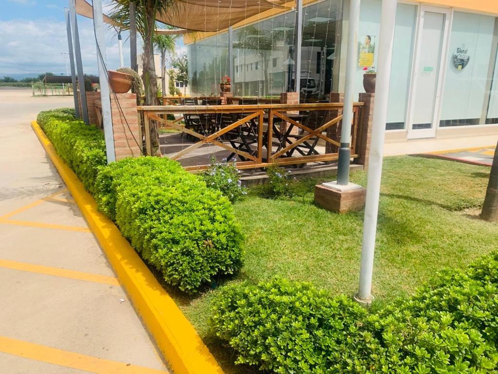 a building with a porch with a table in it at Dormis Sinsacate in Sinsacate