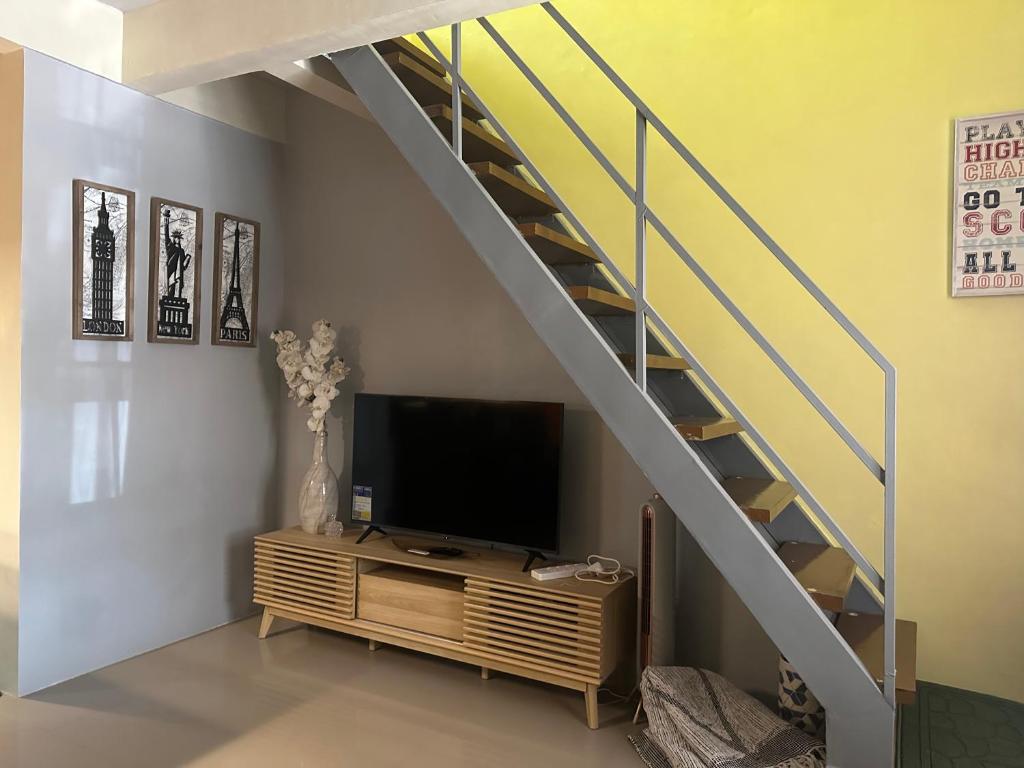 TV a/nebo společenská místnost v ubytování MisyEdz Homes Clark Dau