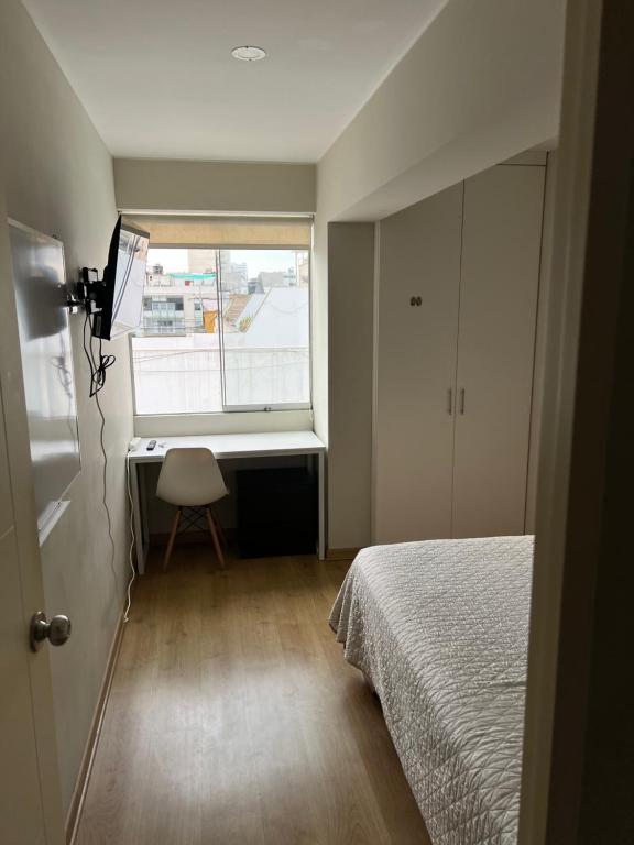 Postel nebo postele na pokoji v ubytování Departamento Compartido San Isidro