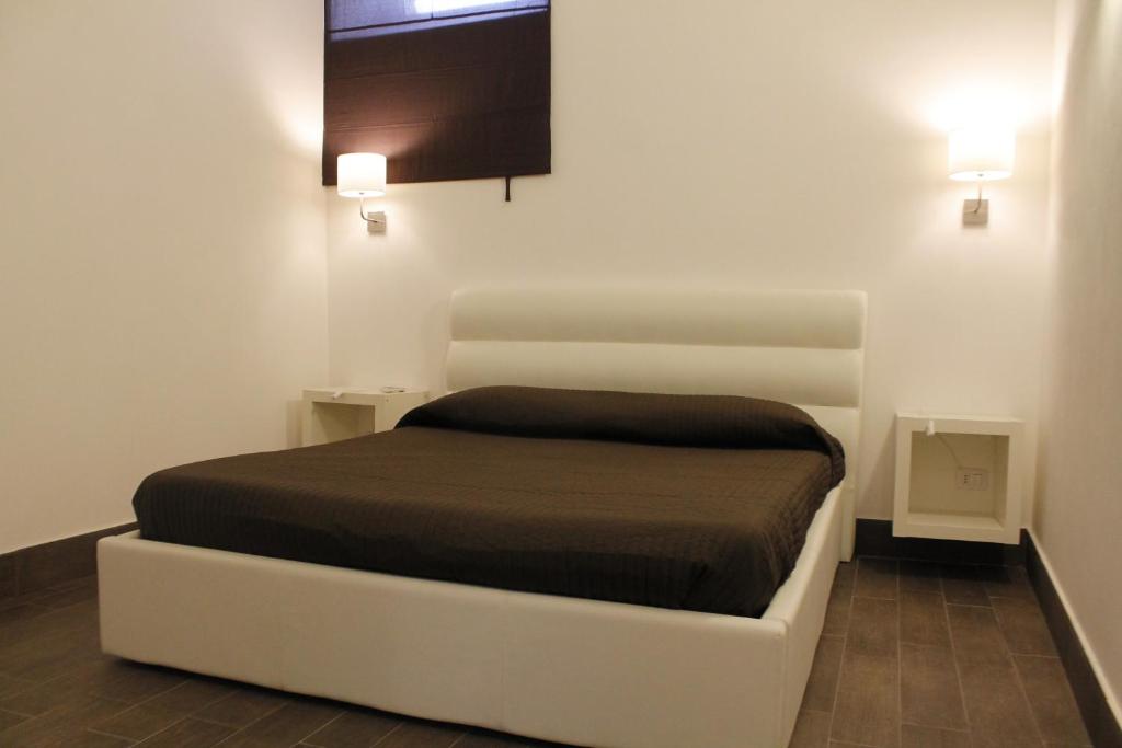 Postel nebo postele na pokoji v ubytování Globe Trotter Apartment