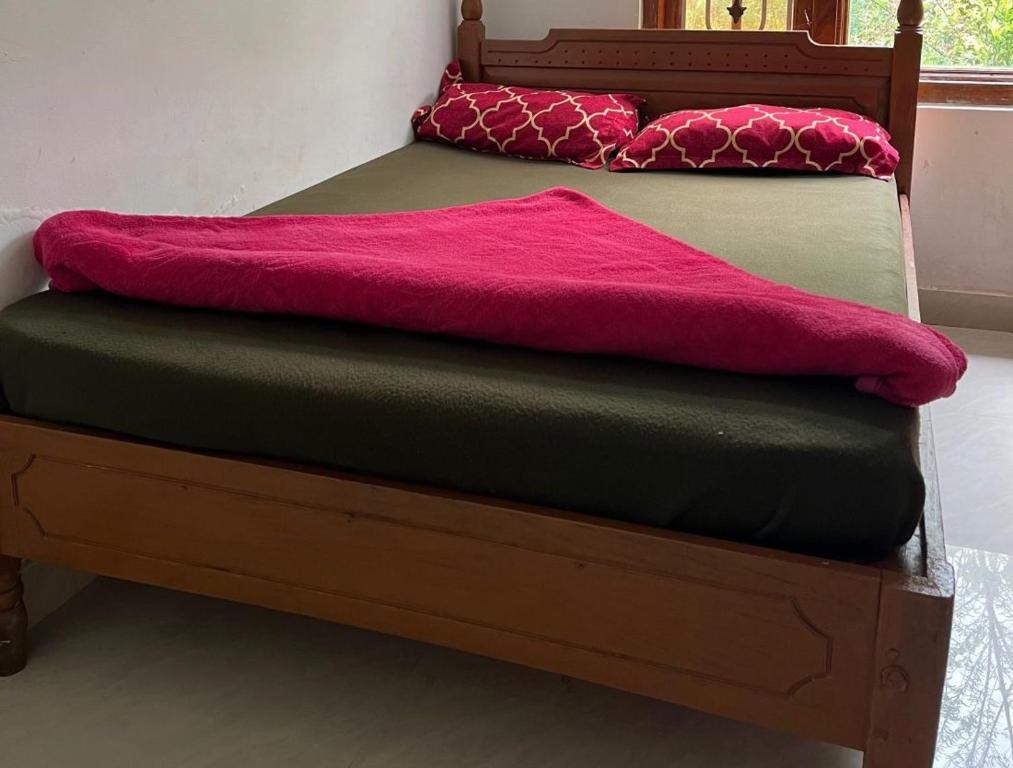 Postel nebo postele na pokoji v ubytování Rima leisure Resort Suryanelli