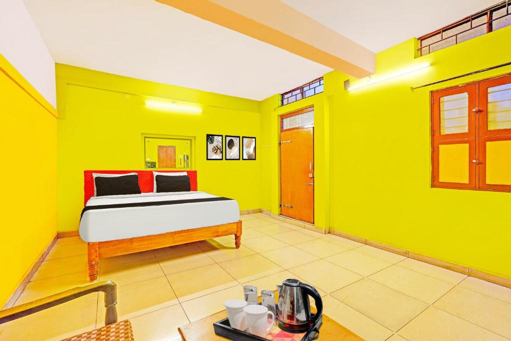 Fotografie z fotogalerie ubytování Super Hotel O Thavalakuppam Near Bus Stand v destinaci Pūrnānkuppam