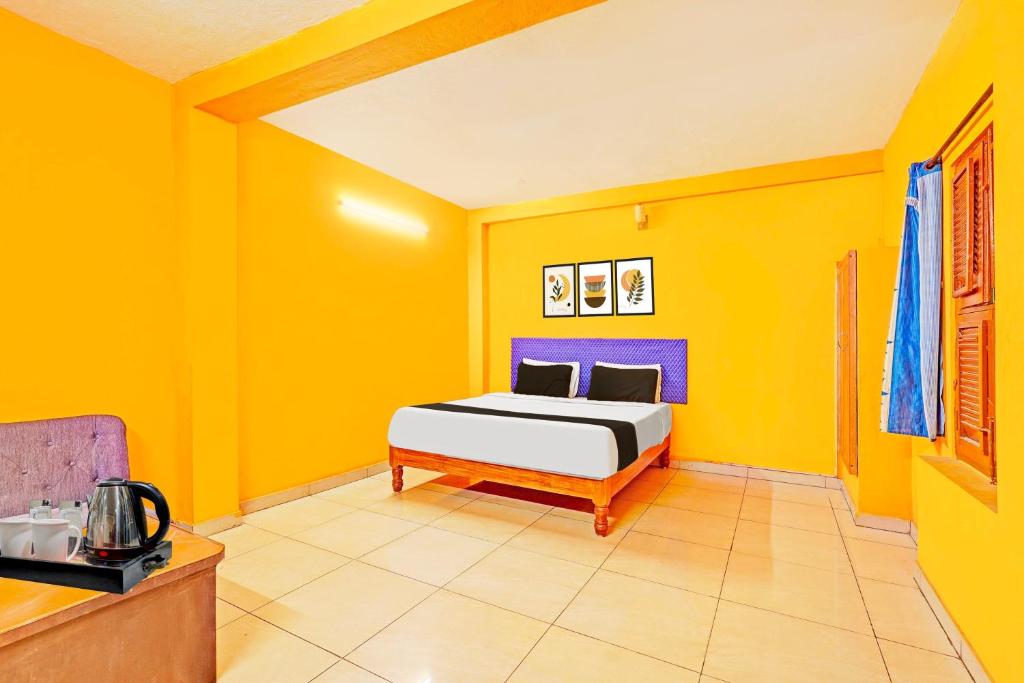 Posezení v ubytování Super Hotel O Thavalakuppam Near Bus Stand