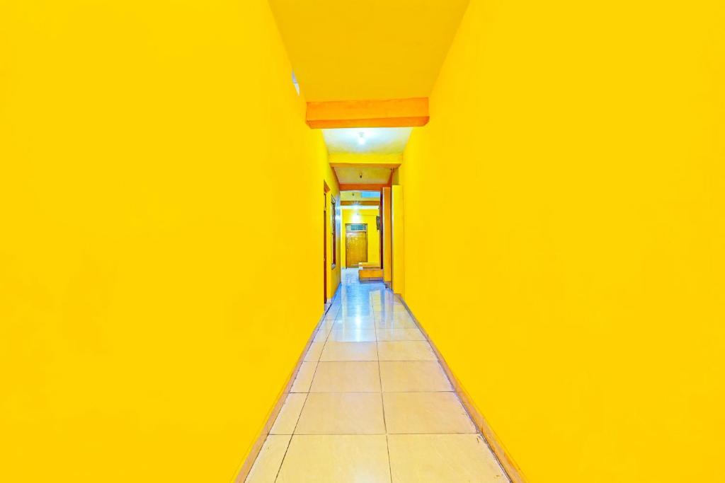 Fotografie z fotogalerie ubytování Super Hotel O Thavalakuppam Near Bus Stand v destinaci Pūrnānkuppam