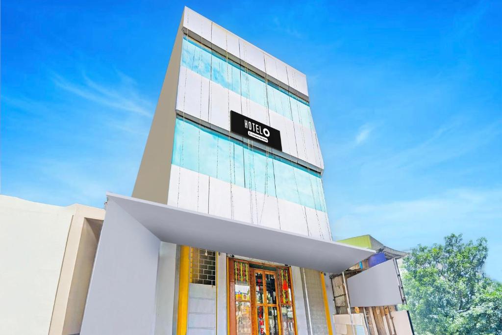 Fotografie z fotogalerie ubytování Super Hotel O Thavalakuppam Near Bus Stand v destinaci Pūrnānkuppam