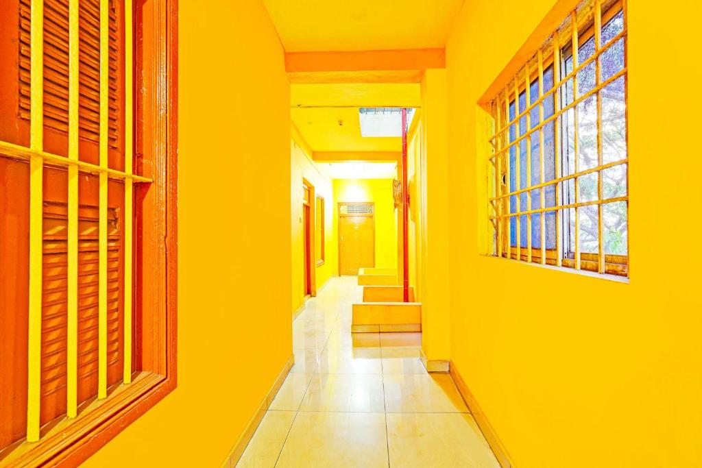 Fotografie z fotogalerie ubytování Super Hotel O Thavalakuppam Near Bus Stand v destinaci Pūrnānkuppam