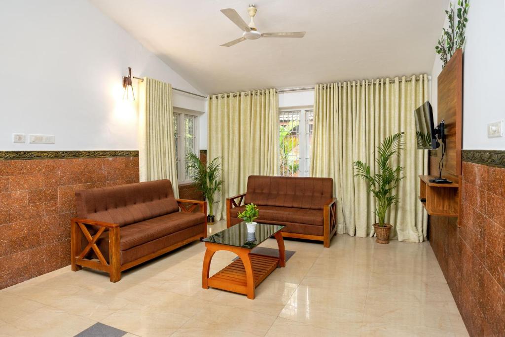Posezení v ubytování Lakkidi Village Resort Wayanad
