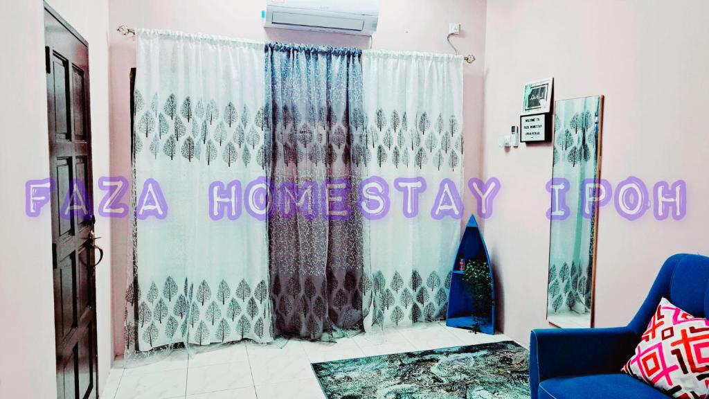 Χώρος καθιστικού στο Faza Homestay Meru Ipoh
