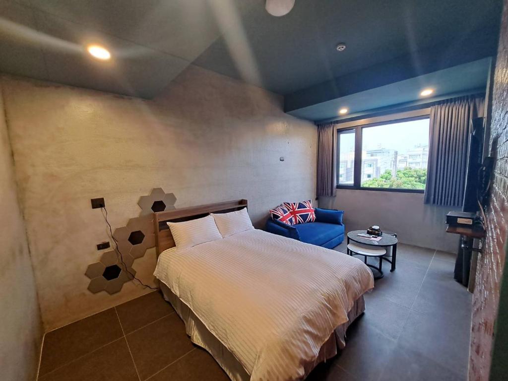 Postel nebo postele na pokoji v ubytování Chunfang Residence