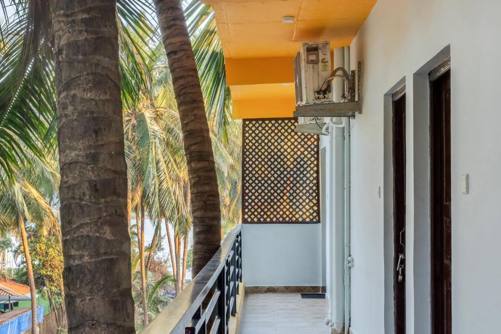 A balcony or terrace at Earthy Hostel & Suites - Morjim