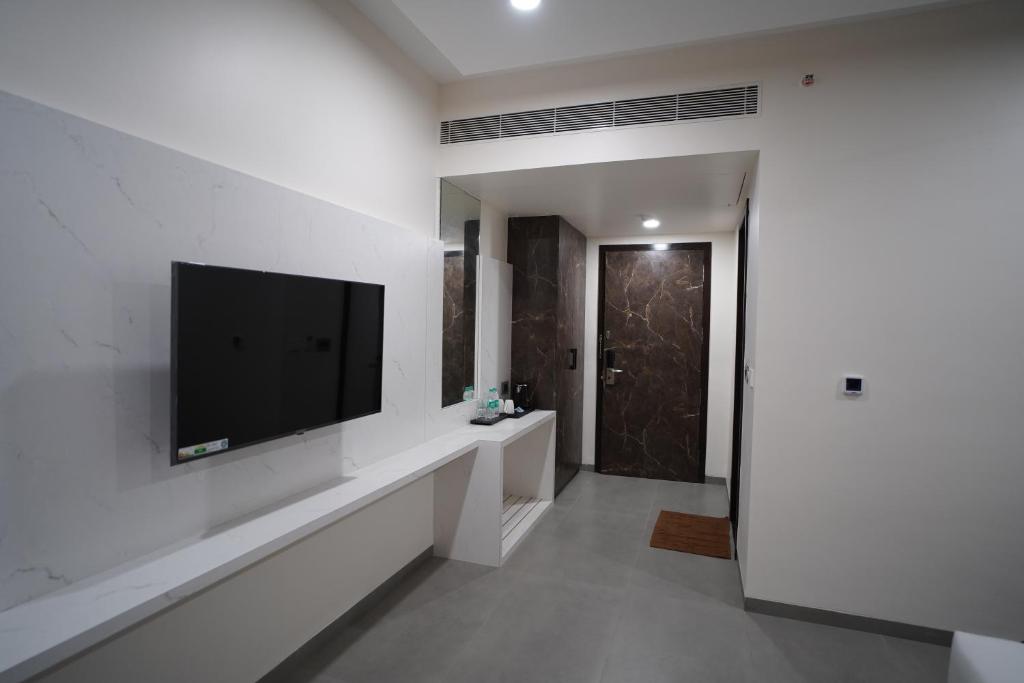 TV a/nebo společenská místnost v ubytování Hotel Sastha Grand