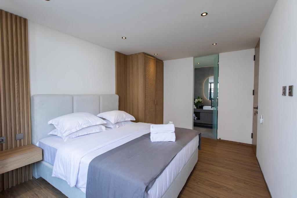 Postel nebo postele na pokoji v ubytování 20 Suites Umalas