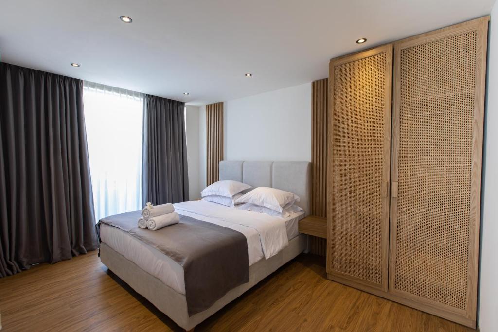 Postel nebo postele na pokoji v ubytování 20 Suites Umalas