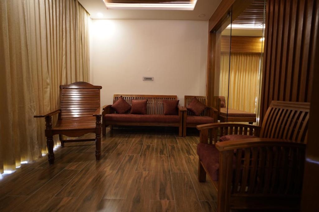 Posezení v ubytování Hotel Sastha Grand