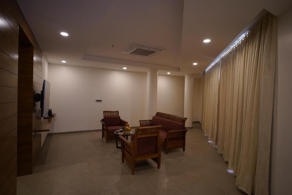 Posezení v ubytování Hotel Sastha Grand