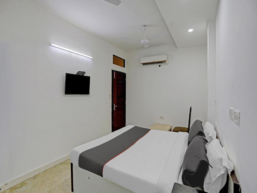 TV a/nebo společenská místnost v ubytování The Pinaki Residency