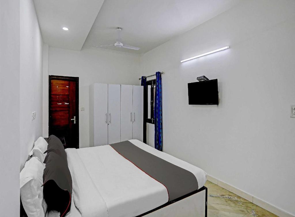 TV a/nebo společenská místnost v ubytování The Pinaki Residency