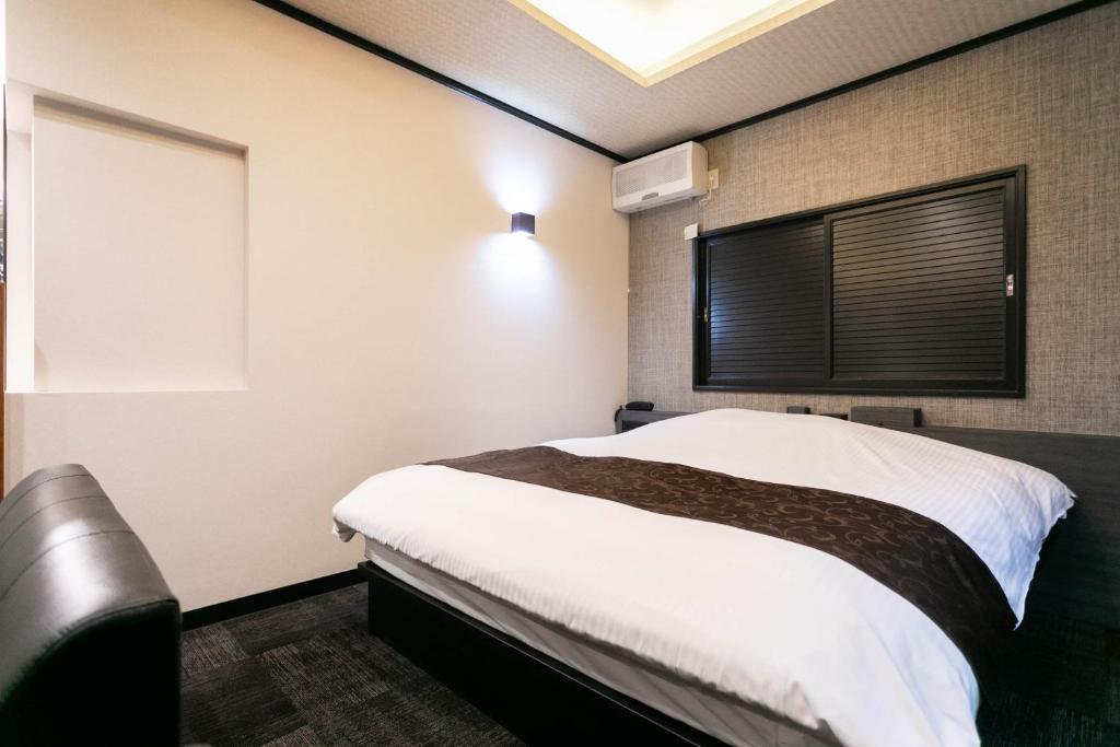 TV a/nebo společenská místnost v ubytování Hotel TEMARI Matsumoto