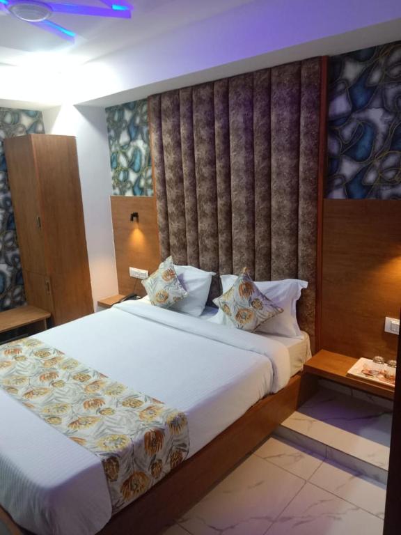 Postel nebo postele na pokoji v ubytování Hotel Lemon Gota