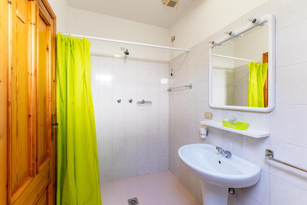 Koupelna v ubytování Albergo Alle Alpi
