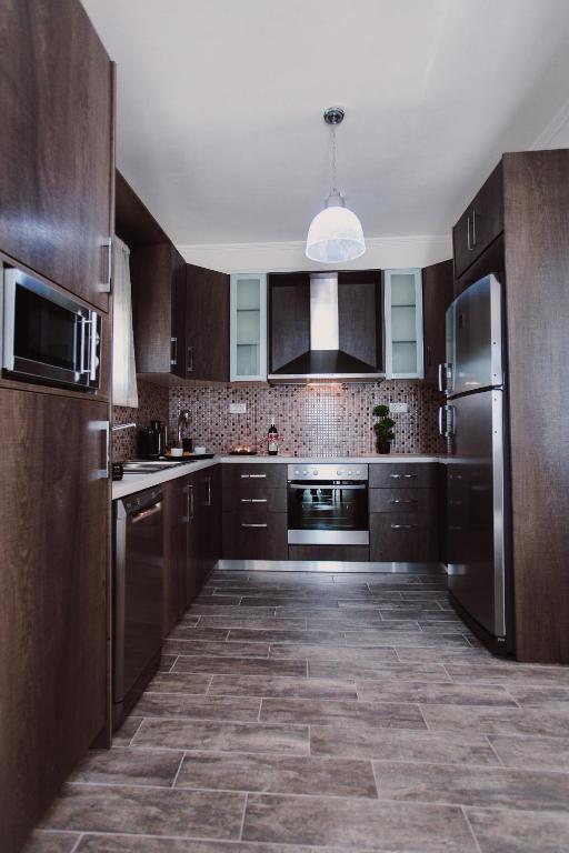 Kuchyň nebo kuchyňský kout v ubytování Ionian Diamond Villas