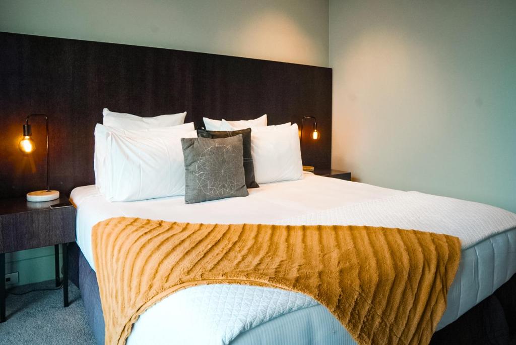 Postel nebo postele na pokoji v ubytování The Dome Boutique Apartments