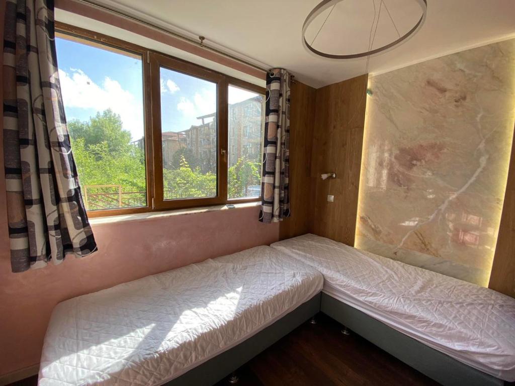 Postel nebo postele na pokoji v ubytování Renta BG Apartments in Tsarevo
