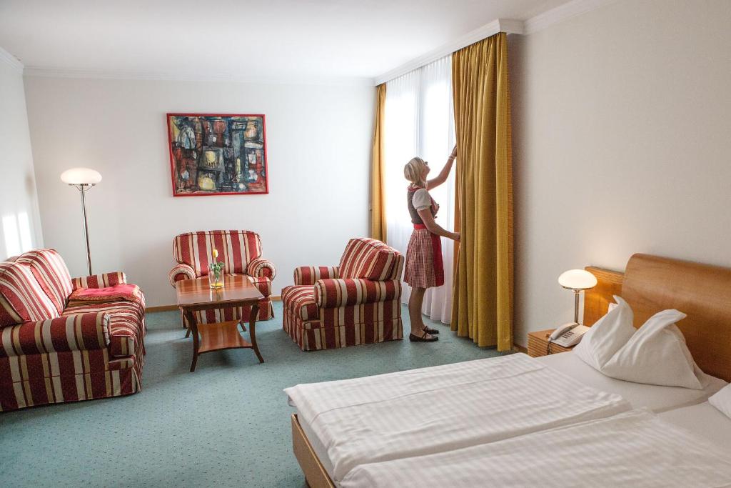 Postel nebo postele na pokoji v ubytování Hotel Exel