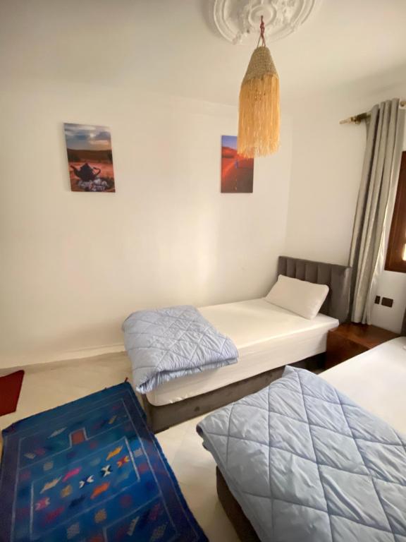 Postel nebo postele na pokoji v ubytování Mira Guest House