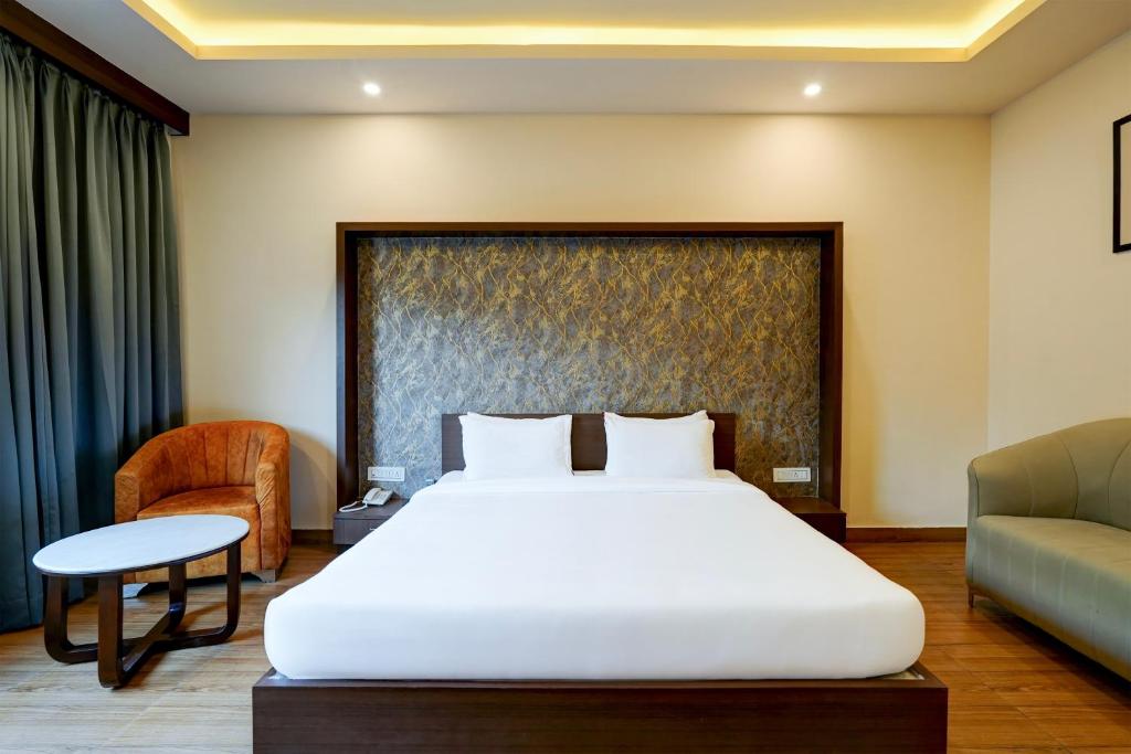 Postel nebo postele na pokoji v ubytování Hotel Aerotech Plaza