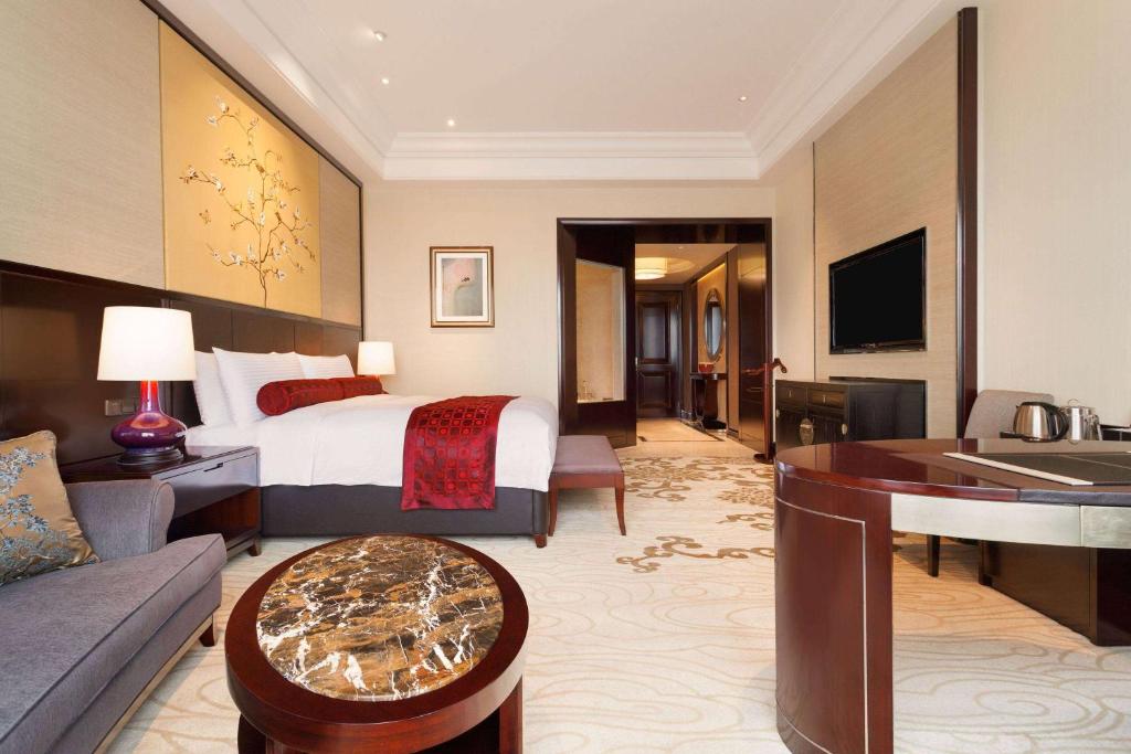 TV a/nebo společenská místnost v ubytování Wyndham Grand Xi'an Residence