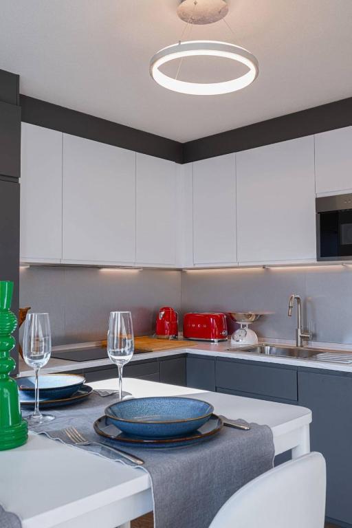 Kuchyň nebo kuchyňský kout v ubytování One Only Losone Apartment
