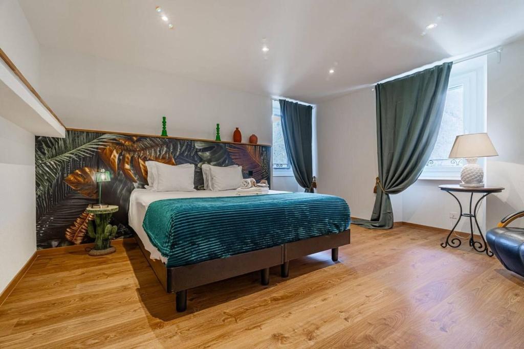 Postel nebo postele na pokoji v ubytování One Only Losone Apartment