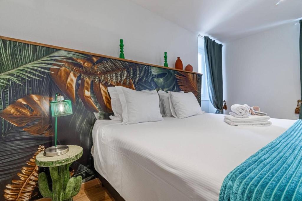 Postel nebo postele na pokoji v ubytování One Only Losone Apartment