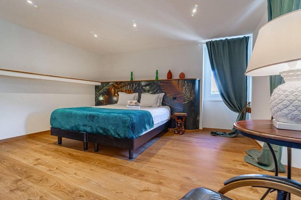 Postel nebo postele na pokoji v ubytování One Only Losone Apartment