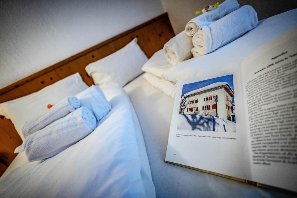 Postel nebo postele na pokoji v ubytování Hotel Grizzly