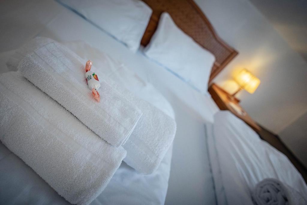Postel nebo postele na pokoji v ubytování Hotel Grizzly