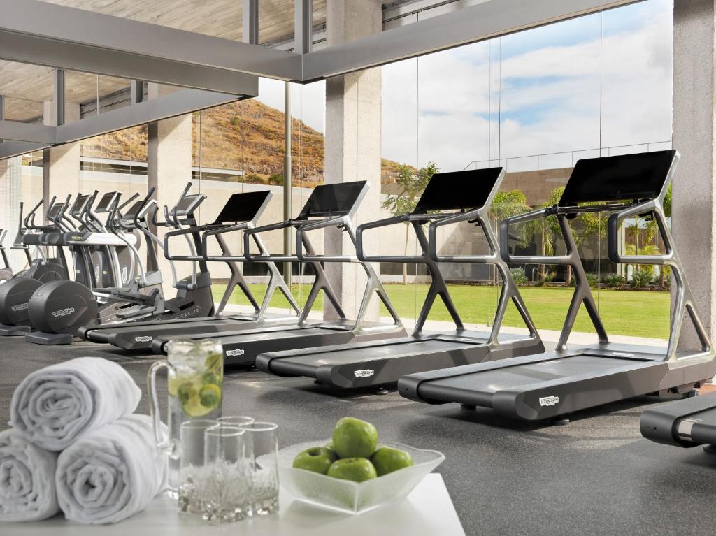 a row of exercise bikes in a gym at Iberostar Heritage Grand Mencey in Santa Cruz de Tenerife