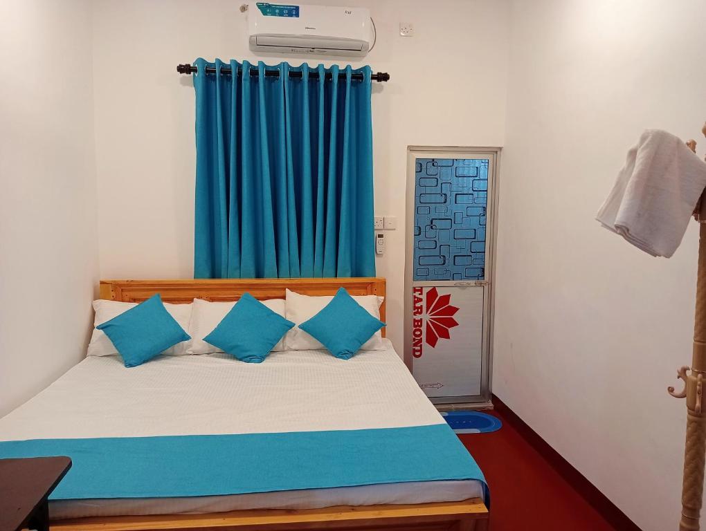Postel nebo postele na pokoji v ubytování Cha Cha Guest House